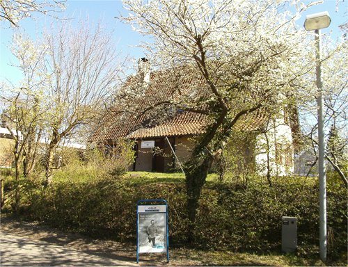 Optikeren Olsbk Strandvej 33 set fra P-pladsen